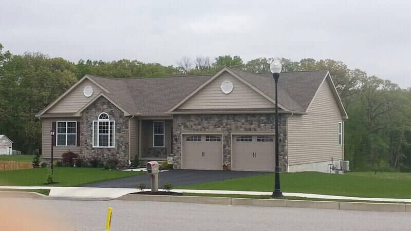 Two-story frame home with a new shingle roof in Dallastown, PA