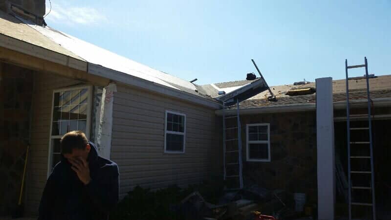 Mid-install low-slope roof transition on a Dallastown Roofing project
